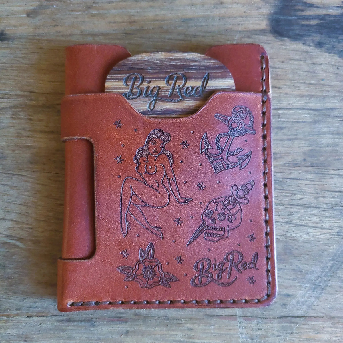 Front of Big Red Tattoo Minimalist Wallet in full-grain English Tan leather with engraved tattoo artwork