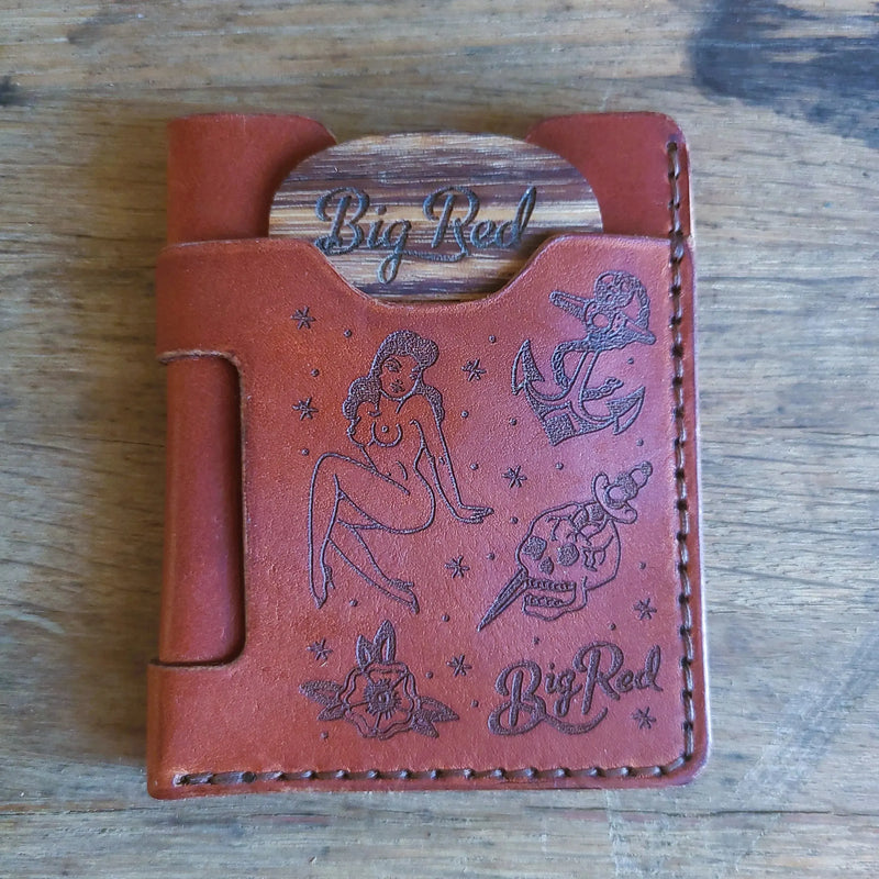 Front of Big Red Tattoo Minimalist Wallet in full-grain English Tan leather with engraved tattoo artwork