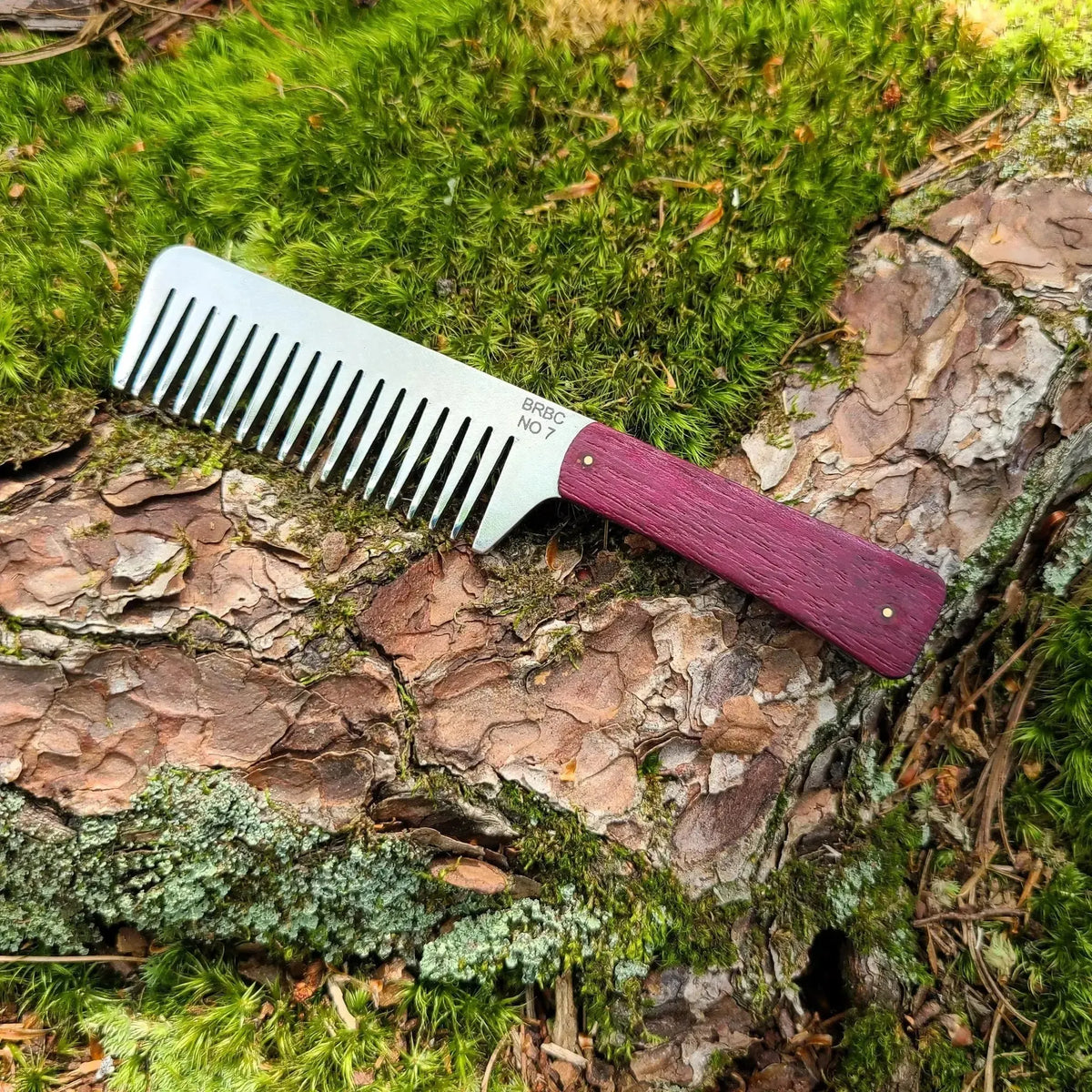 No. 7 stainless steel beard comb with a purpleheart wood handle